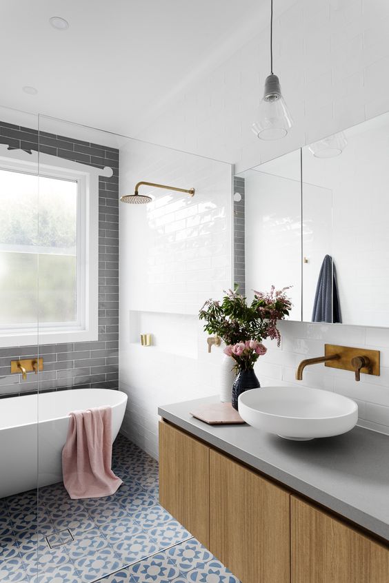 Unplanned and coincidentally enough, this open shower and tub space is the same as the fourth image, simply showing you more of the overall bathroom layout and continued minimal hardware. Love it even more!