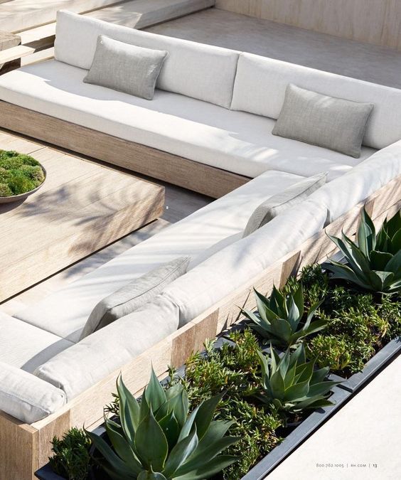 This first set *actually* isn't built-in furniture as far as I can tell, but it's one heck of a sectional! I love the size and clean lines. I can picture a lot of relaxing time spent with friends in this type of setting. And I love the succulent plant wall to edge the space. #backyard inspiration via www.L-2-Design.com