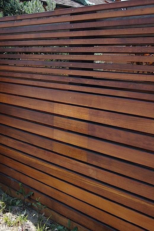 Another fence with varied widths, but this one gradients to smaller sizes at the top. This is an interesting style that would allow for more privacy in lower sections and more air/openness at standing vision height. #backyard #fence inspiration via www.L-2-Design.com
