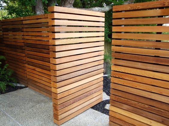 This modern wooden gate is to die for: hidden hardware, offset pivot, clean lines. So gorgeous. It's also made of much thicker wood than I'll be using, but someone....go forth and make this beauty! #modern wooden fence gate inspiration via www.L-2-Design.com