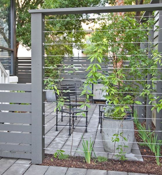 A modern wire fence might provide a place for flowering vines to grow as well as safety sightlines. Fence #inspiration via www.L-2-Design.com