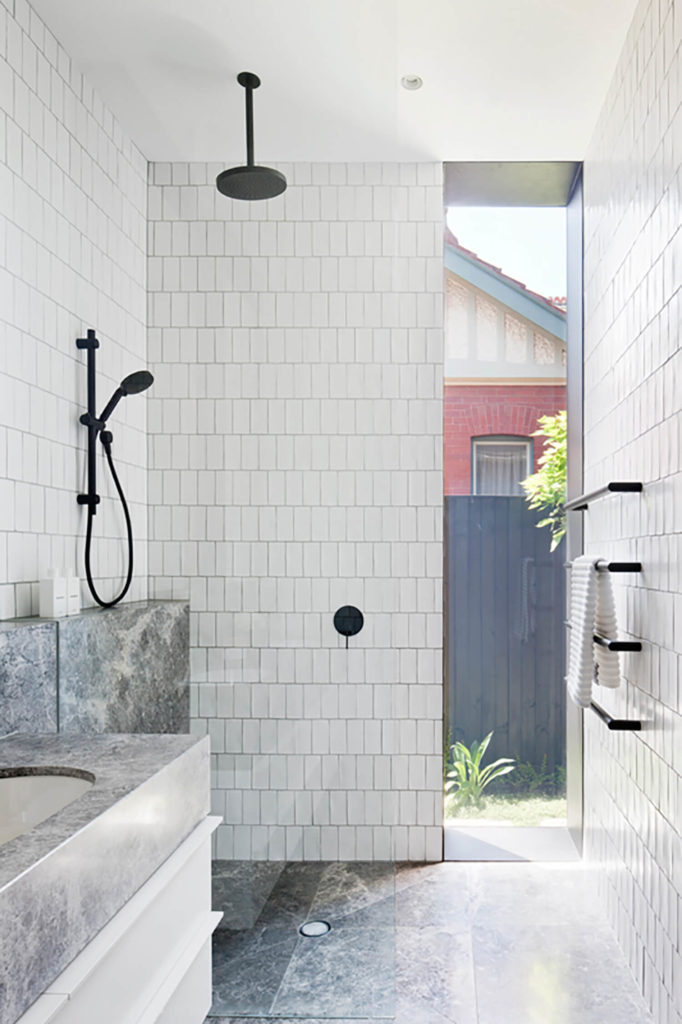 This black shower hardware selection from Mim Design works in concert with the rest of the bathroom. via www.L-2-Design.com