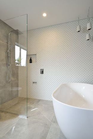 Another walk-in shower with an awesome bathroom tile accent wall. More Aesop? Not sure...and what is that baby alcove down at the bottom? #bathroom inspiration via www.L-2-Design.com