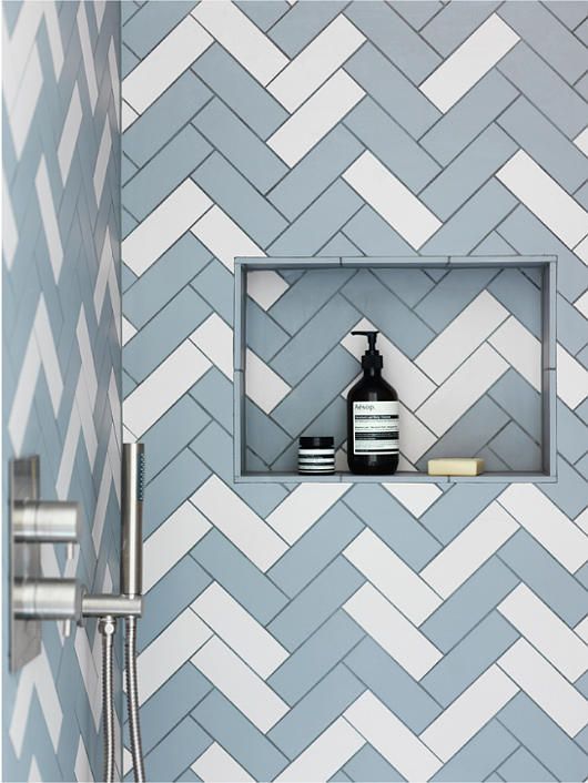 Studio Maclean starts off the group today with some colorful herringbone subway tile. I don't know about you, but I think it would be invigorating to take a shower and look at this tile each morning...as long as you had a REALLY good tile installer. As much as I love the pop, I do get concerned that this will be a trend that doesn't last. I do love the details at the alcove, though. Bathroom shower tile inspiration via www.L-2-Design.com