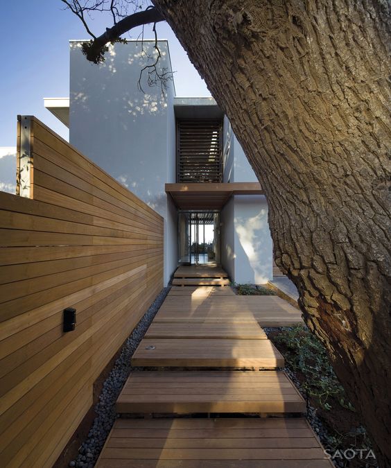 Starting strong out of the gate is this beauty from SAOTA. While I'm not doing square tube posts, I love the precision of detail in the edge conditions. The stepping of the fence line will definitely occur at #L2HQ because of grade change and this is a great example of how to do it well. #Backyard inspiration via www.L-2-Design.com