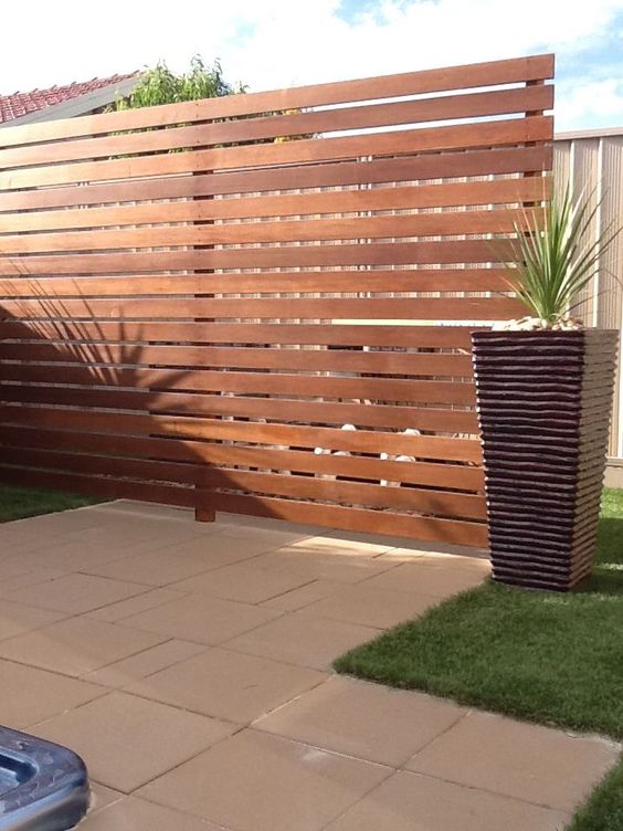 While this runs a bit more contemporary overall, I love the simplicity of this fence design. The parts and pieces are performing exactly as they were made to. I don't think I will be face-screwing my ipe, but if I did, the screw precision would look like this.  #Backyard inspiration via www.L-2-Design.com