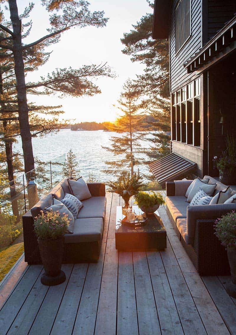 This last lake cabin looks more like a year-round house - and who wouldn't want that view every day?!? #backyard inspiration via www.L-2-Design.com