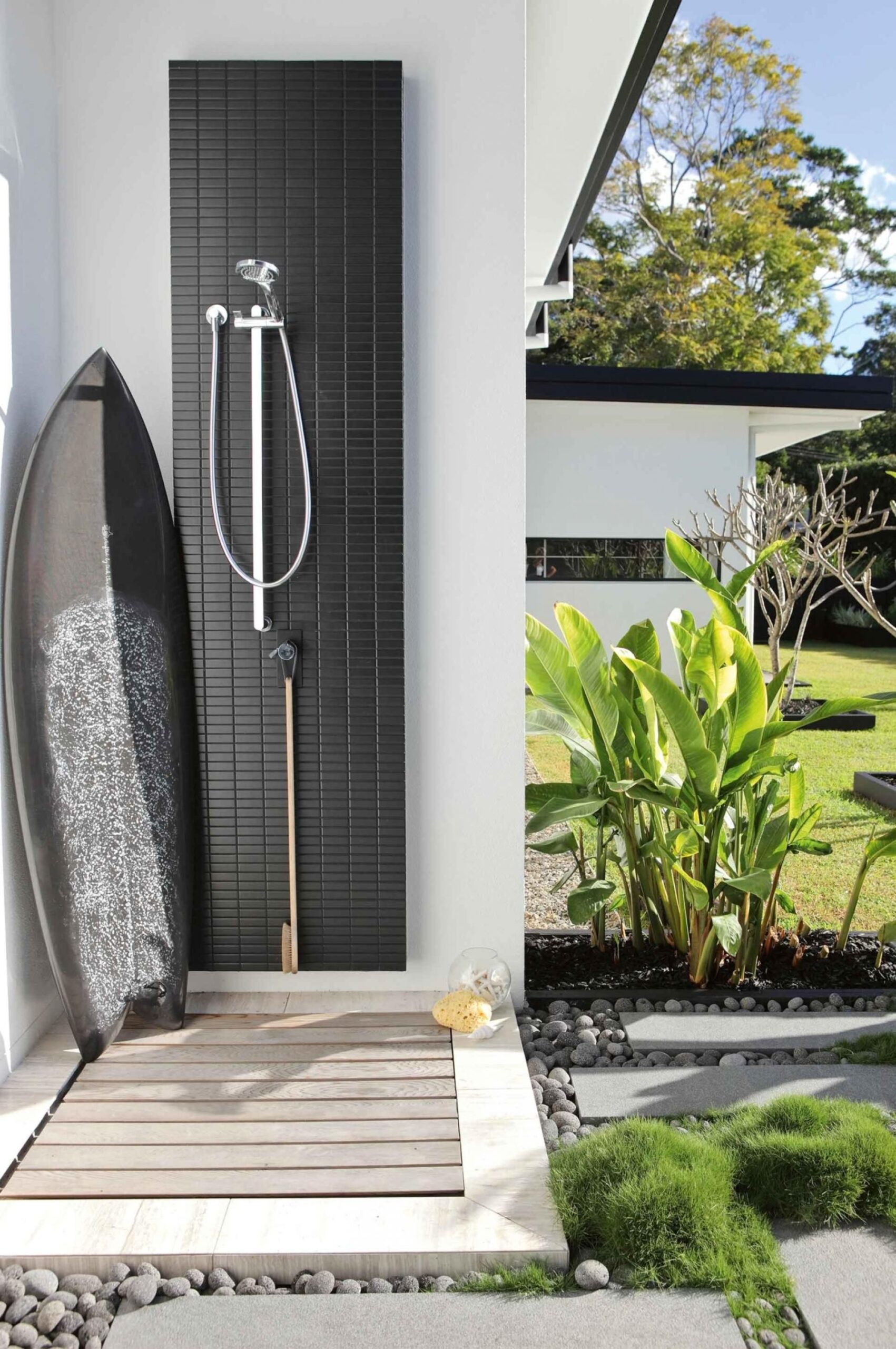 This beachy outdoor shower is built into the home in a secluded corner. #backyard inspiration via www.L-2-Design.com